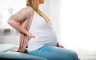 Whats causing my back to ache so badly in pregnancy ?